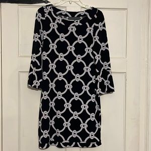 White House Black market brand dress. Black with white chain-link design print.